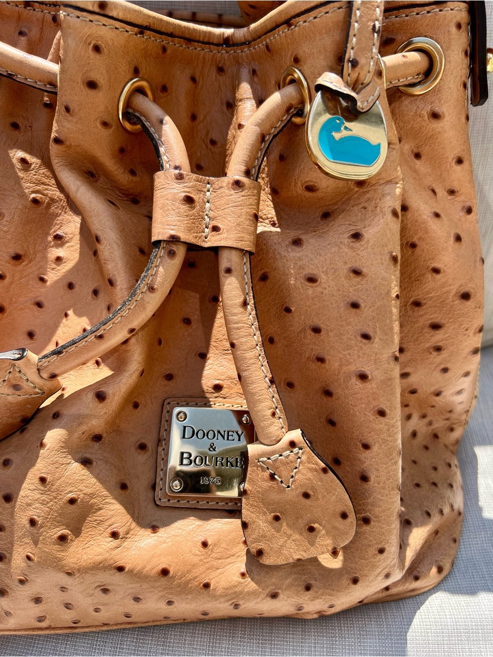 Dooney & Bourke Tan Ostrich-Embossed Leather Drawstring Bucket Bag - Picture 2 of 8